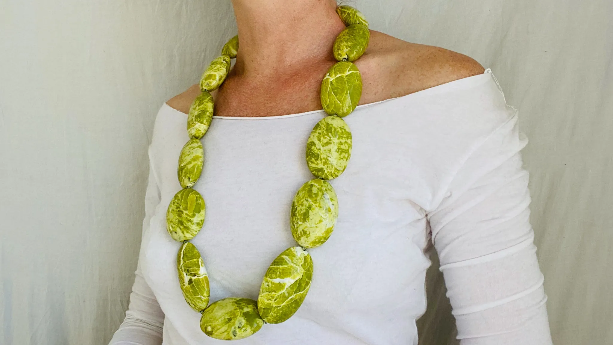 Long Serpentine Necklace. Yellow  Green. Large Spherical Beads.